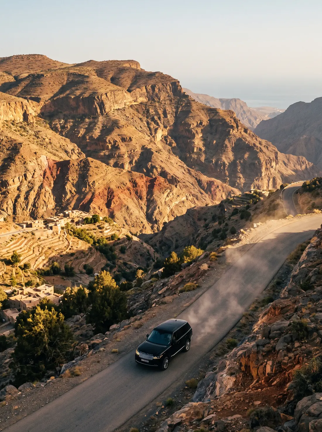 Black SUV on the mountain road up Jebel Akhdar